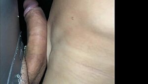 Girlfriend passionately taking dick in gloryhole at Red party.