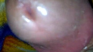 Intense handjob on monster cock during bed masturbation