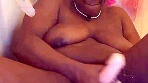 Black milf shaves her wet pussy for orgasm. She uses toys in homemade close-up.