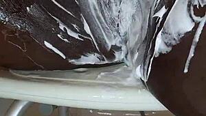 Black milf shaves her wet pussy for orgasm. She uses toys in homemade close-up.