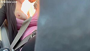 Artemisia Love flashes her big boobs during a horny car ride.