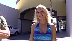 blonde porn babe with big fake tits tyann mason gets coated in cum on bed