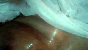 an argentinian woman received an oiled massage, focusing on her back and legs in a relaxing session.