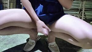 Ladyboy Jerks Off Outdoors Under Skirt