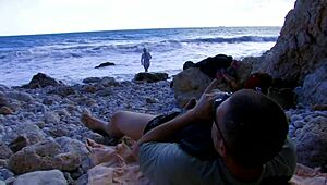 Blonde Tattooed Mommy Rides Big Cock on Beach with Lingerie and Fishnets. Anal Action Includes Gaping and Deepthroat.