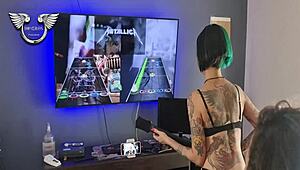 Friends playing guitar hero then making out and sucking each other?