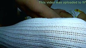 Student and Stepmother Share Intimate Moment in Living Room