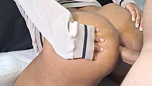 Ebony teen bends over for monster cock anal gaping.