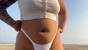 Redhead Flashes Swollen Pussy Lips on Beach