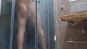 Horny and sexy guy jerks in shower with moans.