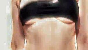 Leticia poses as a sexy model in bikini