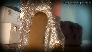 in the dungeon, the femdom goddess mesmerizes her slave with her sparkle boots, commanding him to lick her ass while she teases with her legs