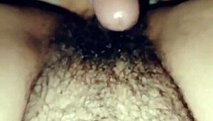 Mature woman at home plays with her dildo