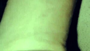 Mature woman at home plays with her dildo