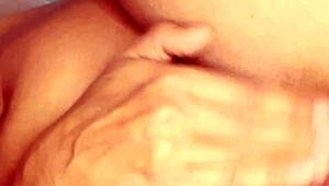 in this hentai anime, she's getting her ass fucked in a standing position, and it leaves a lot of creamy cum behind