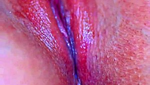 Watch that puffy pussy take a glass dildo!