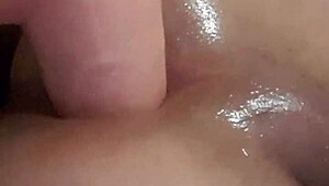 Tight shemale contrasts soft play with huge dildo insertion