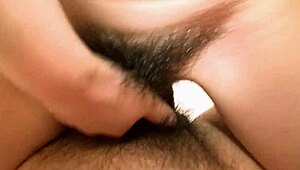 Pretty Asian Brunette Rie Obata Kneads Her Hairy Pussy With A Vibrator