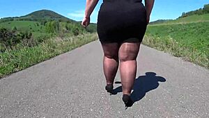 Mature bbw in nylon pantyhose and high heels walks public road. Foot fetish big booty asmr.
