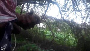 outdoor masturbation session ends with a cum shot in the trees
