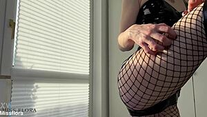 latex tease in fishnets and boots, so sexy 😘