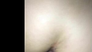 this petite big booty latina is getting fucked doggystyle by a huge cock