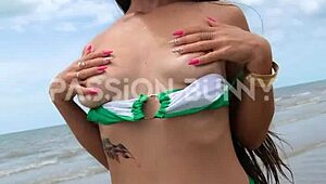 Sexy babe flashes and walks on public beach
