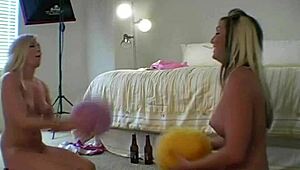 lesbian models play ball during nude photoshoot backstage