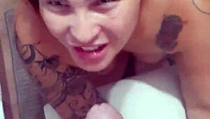 The huge husband commands his wife to kneel and suck his massive cock while admiring her big ass.