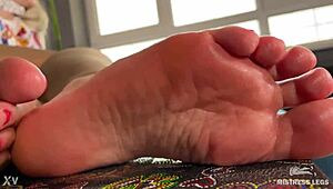 goddess with pink oily soles and toes lazily teases you foot fetish closeup