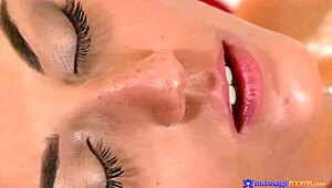 teen brunette explores oiled natural tits in massage room