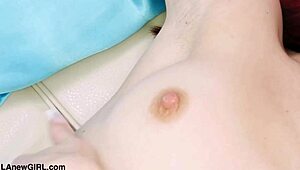 red haired model reveals her body in a photoshoot session