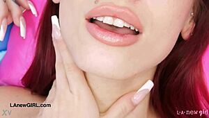 red haired model reveals her body in a photoshoot session