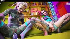 two tattooed lesbians explore anal with big toys