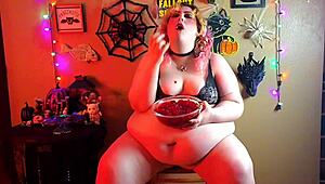 Bbw vampire indulges in a jello snack during halloween festivities