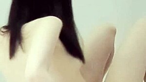 Young Brunette in Sexy One-Piece Swimsuit Pose