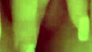 Babe relaxes in bathtub, gently touching her body softly