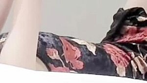 Young Brunette in Sexy One-Piece Swimsuit Pose