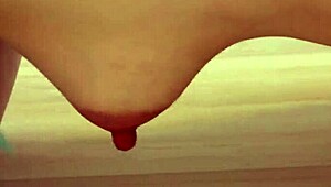 Nurse Assists Pregnant Lesbian With Medical Gloves