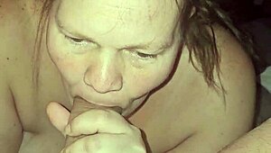 milf with big nipples kneels and sucks my big cock. she moans passionately