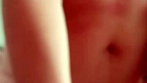 mature woman gives intriguing handjob during massage session