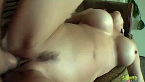 Oh wow, this mature brunette milf with big fake tits fingers her trimmed pussy and blows the married man in heels!