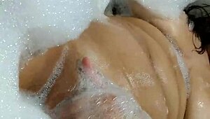 hot brunette gaucha masturbates in motel bathtub with giant dildo orgasm
