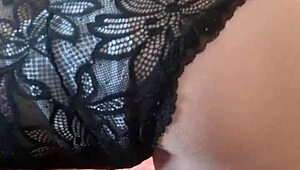 Bold ebony whore fingers her pussy while bound in bondage