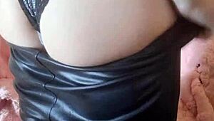 Bold ebony whore fingers her pussy while bound in bondage