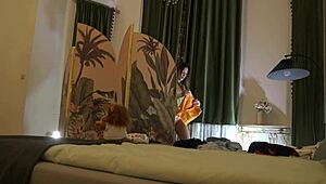 Beautiful brunette tries on sexy lingerie backstage