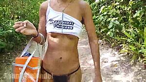 Hairy babe walking and jogging topless in thong, flashing in forest