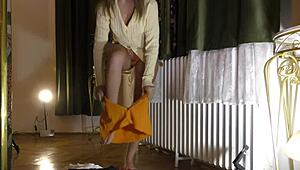 Beautiful brunette tries on sexy lingerie backstage