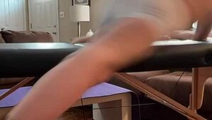 groin stretch in tight spandex shorts with mini soccer ball slowed down