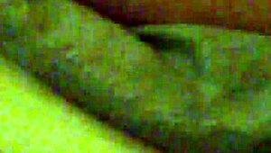 Mzslippery teases with her shaved pussy in front of the mirror